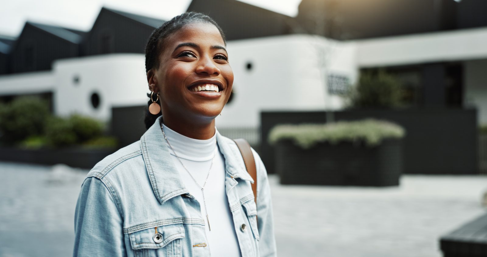 Smiling woman outdoors – online psychiatry in Sacramento, CA